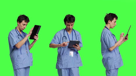 Medical-assistant-browsing-online-webpages-on-tablet-and-texting